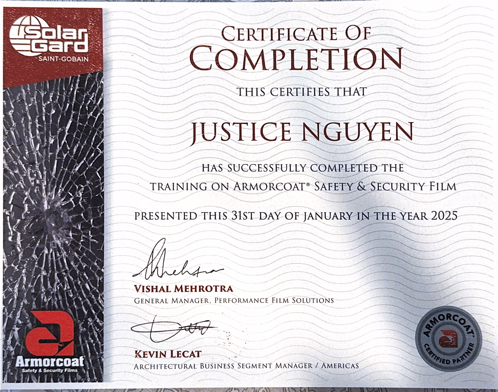 Solar Gard certificate of completion for Armorcoat Safety and Security Film training, presented to Justice Nguyen, January 2025